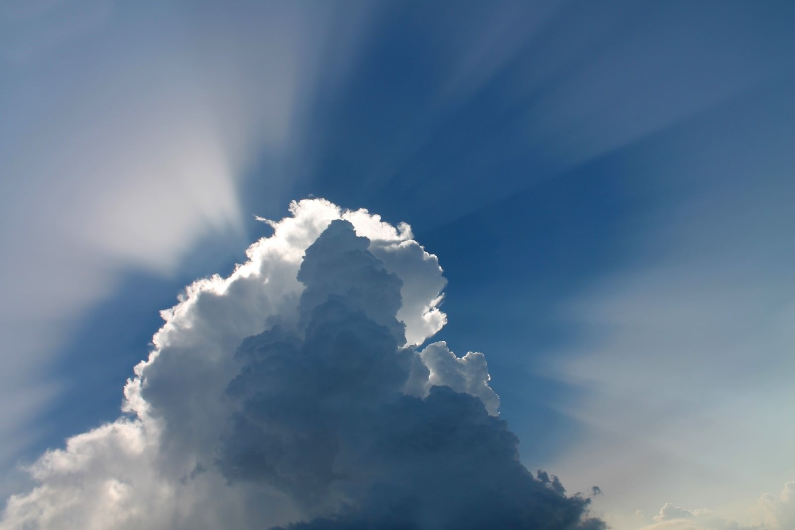 low-angle-view-of-clouds-and-sunbeam